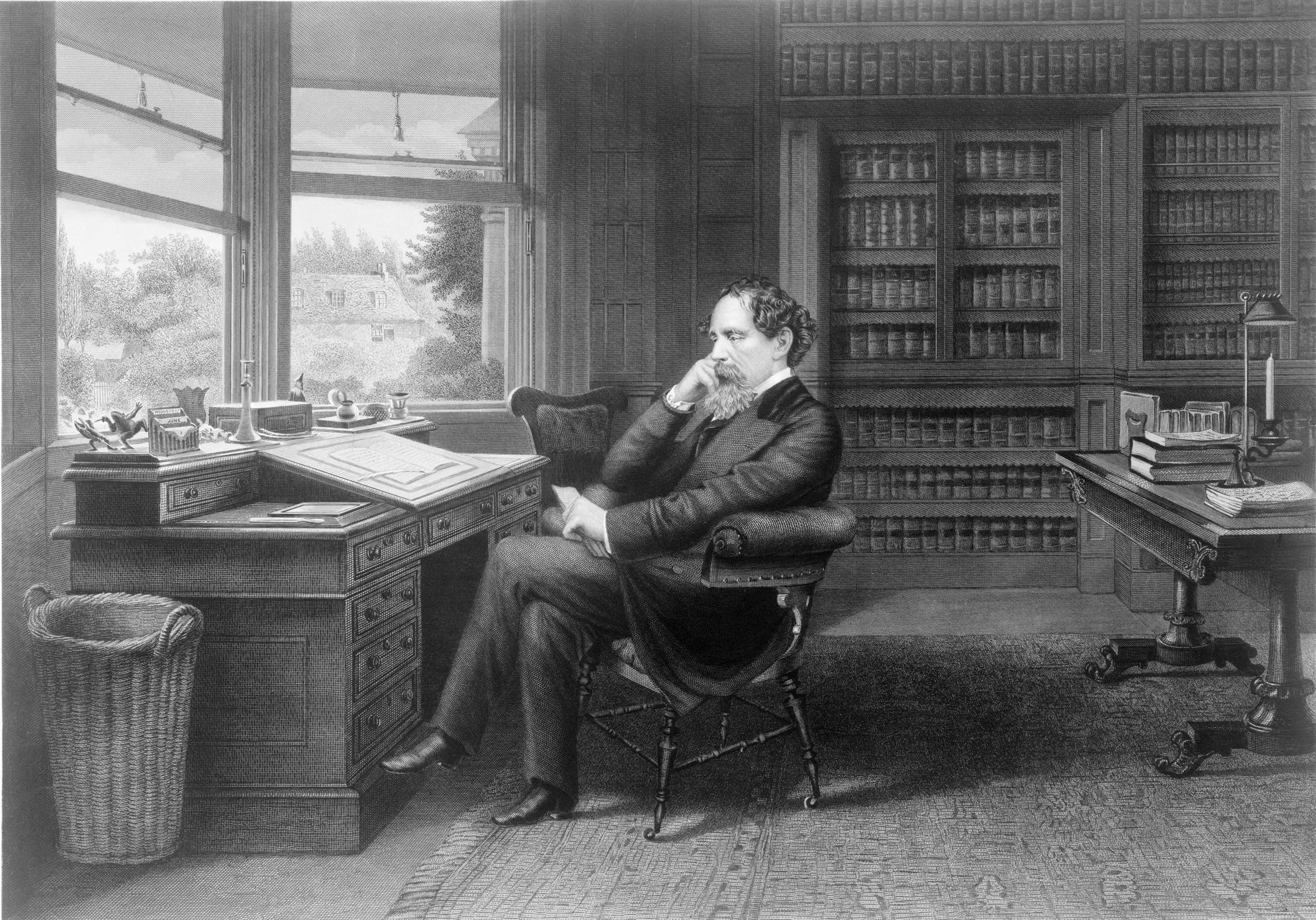 Charles Dickens (1812-1870) in his study at Gad's Hill Place.