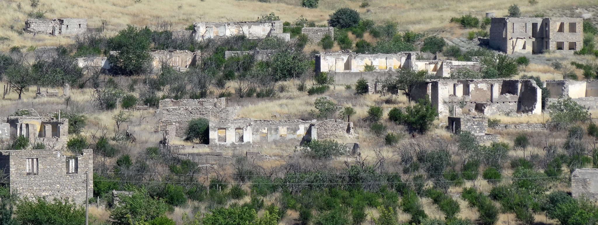 Photograph of ruins in the Nagorno-Karabakh region as a result of the Armenian–Azerbaijani conflict