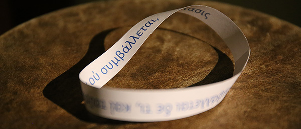 Aristotle and Gender - photograph of mobius strip with greek lettering