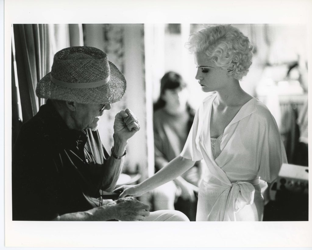 Fig 1: Robert Altman and Jennifer Jason Leigh on the set of Kansas City (1996).