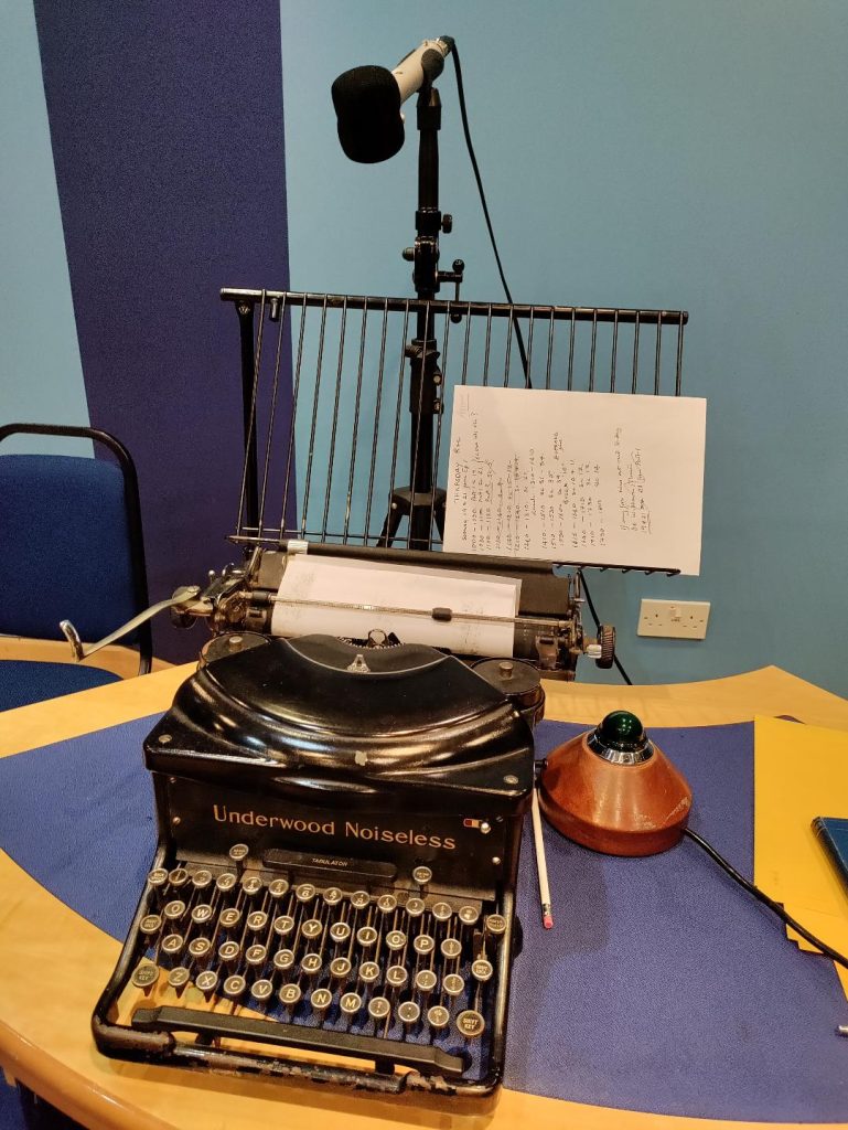 An old typewriter on a desk