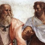 Two men with beards - Plato and Aristotle -dressed in Ancient Greek clothing look at each other whilst walking towards the viewer