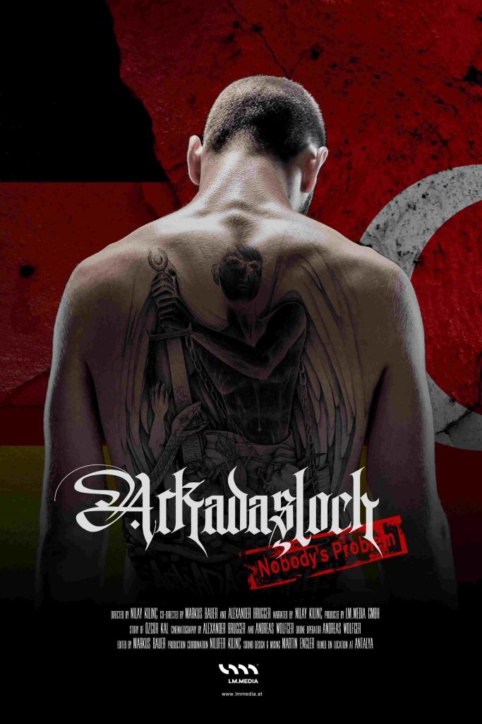 Poster for the documentary Arkadasloch: Nobody's Problem. A man with a shaved head is shown from behind, revealing a large detailed tattoo on his back featuring a somber figure with wings holding a sword. The background is a combination of the German and Turkish flags. The title "Arkadasloch" is written in gothic-style font, with "Nobody's Problem" stamped in red underneath. 