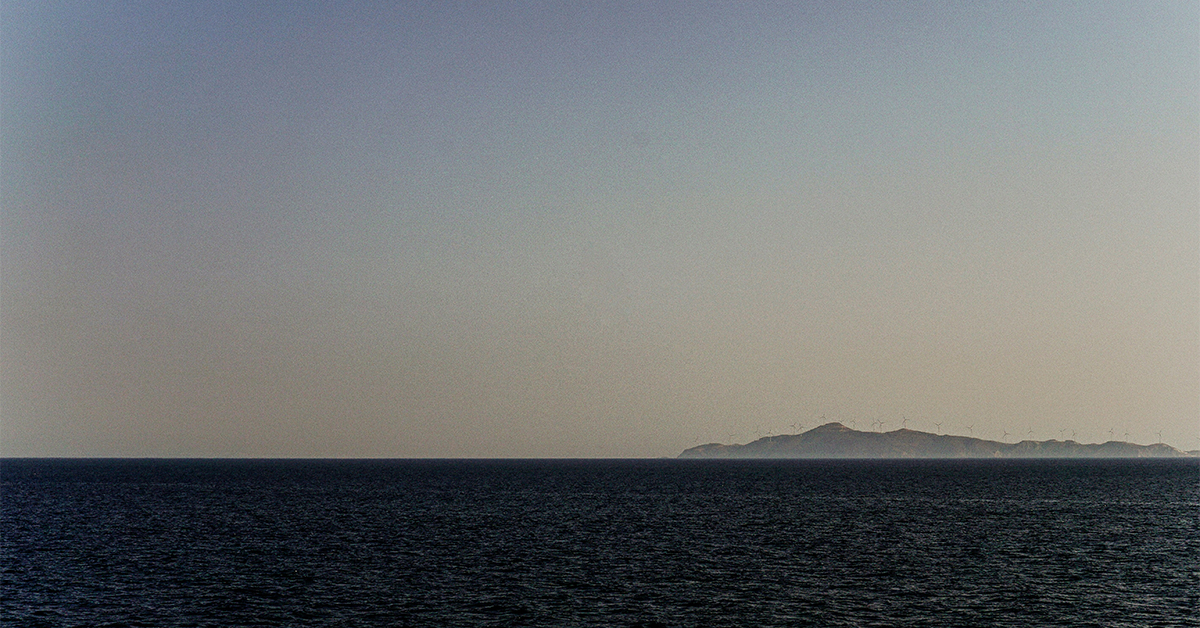 A sunsets below an ocean horizon