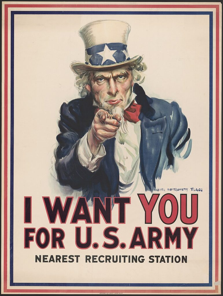 Uncle Sam in a blue and white top hate points directly at the viewer in a 1917 U.S. Army recruitment poster. He is wearing a blue collared jacket, white dress shirt, and red necktie. The poster symbolises propaganda and national identity.