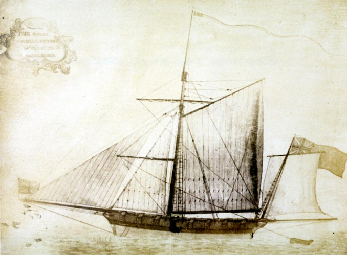 A sepia-toned historical drawing of a sailing ship with two masts. The vessel is shown in profile, featuring multiple rigging lines and sails—some raised and some partially furled. Small flags fly from the masts and stern. The style looks like an old technical or naval illustration, with fine line work detailing the ship’s structure and rigging.