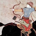 Illustration of an archer in historical attire riding a black horse while drawing a bow and aiming an arrow backward.