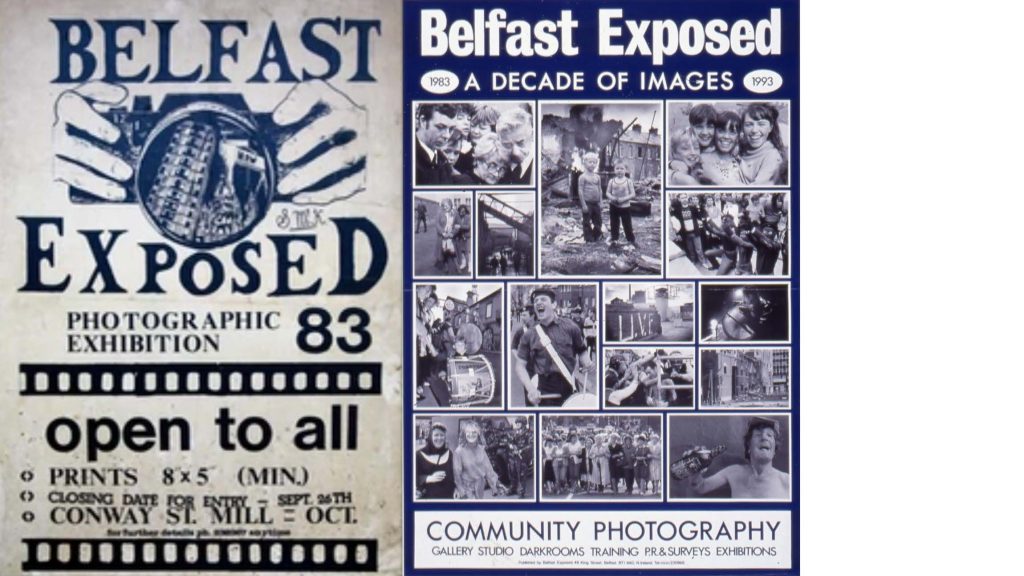 The image shows two posters for the community photography organisation Belfast Exposed. The left poster, dated 1983, advertises a photographic exhibition. Its main graphic is two hands holding a camera, with text giving exhibition details. Across the centre, large print declares “Open To All.” The design is simple, using only white, dark blue, and black. The right poster, dated 1993, marks A Decade of Images. It features a collage of black-and-white photographs of everyday street and community life, especially portraits and groups. Beneath, bold text reads “Community Photography.” The date of the poster on the left is 1983 and on the right around the text ‘A Decade of Images’ are the dates 1983 and 1993.